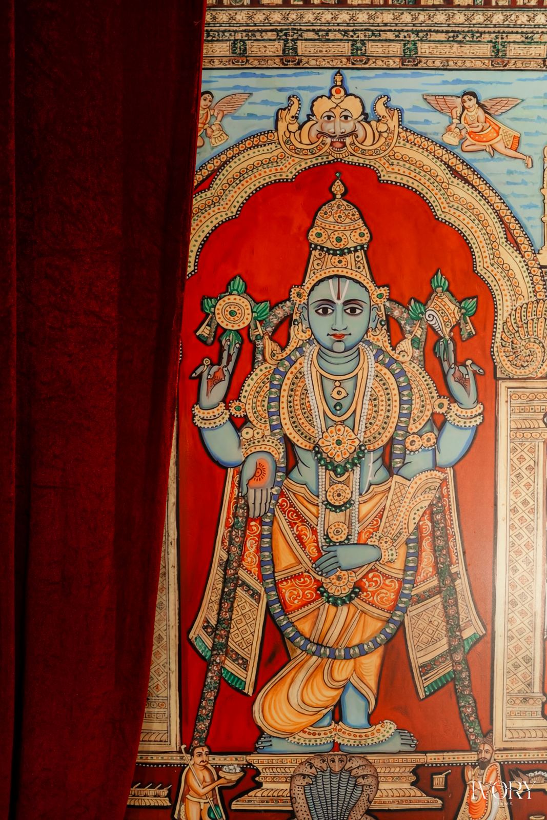 Hand-painted deity mural panel in traditional South Indian style