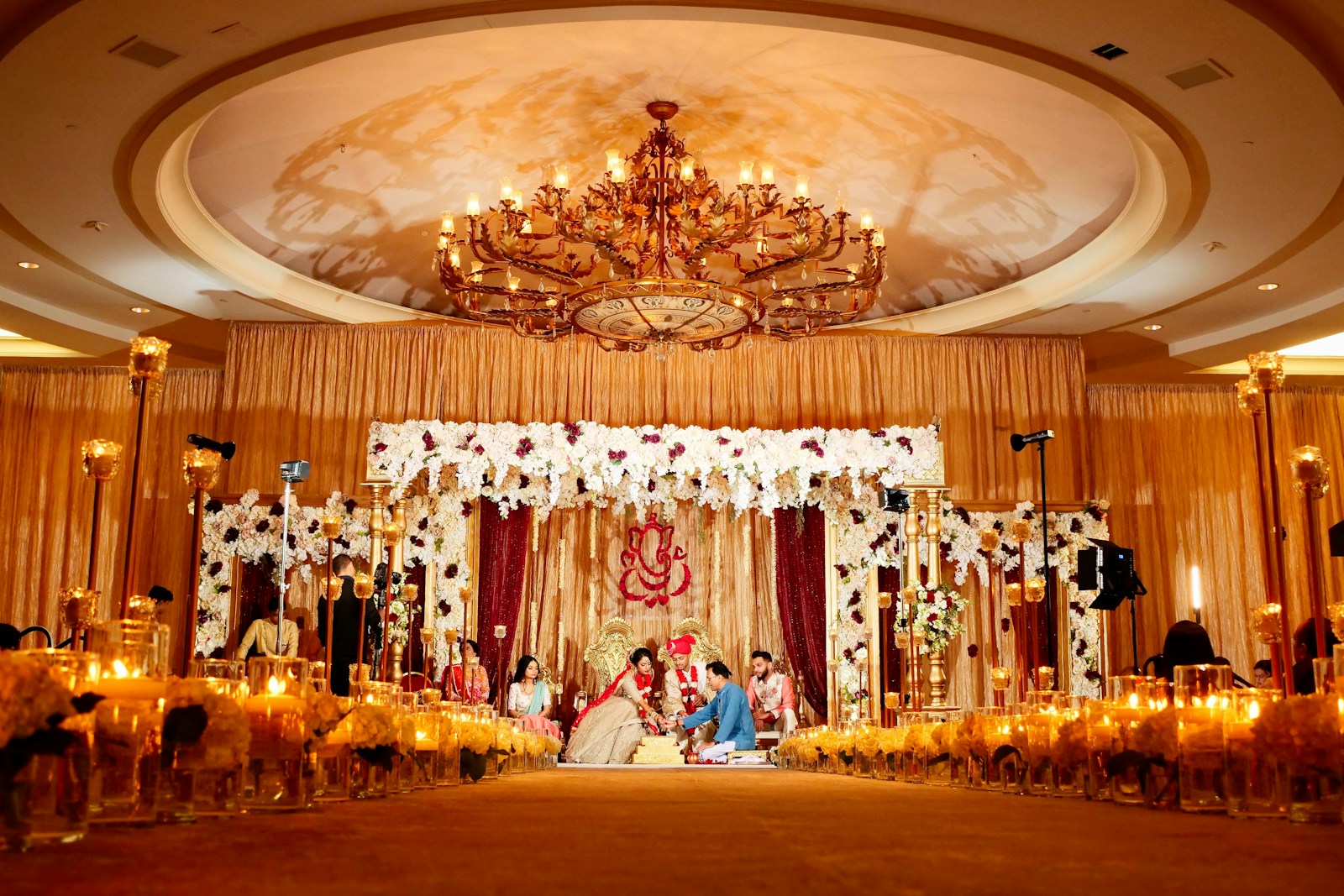 Grand Indian wedding mandap with chandelier — Panigrahana Weddings Goa