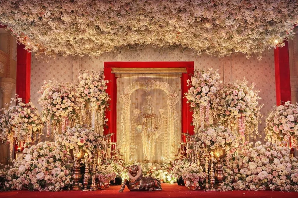 Ganesha bead curtain with blush floral surrounds — Panigrahana decor portfolio