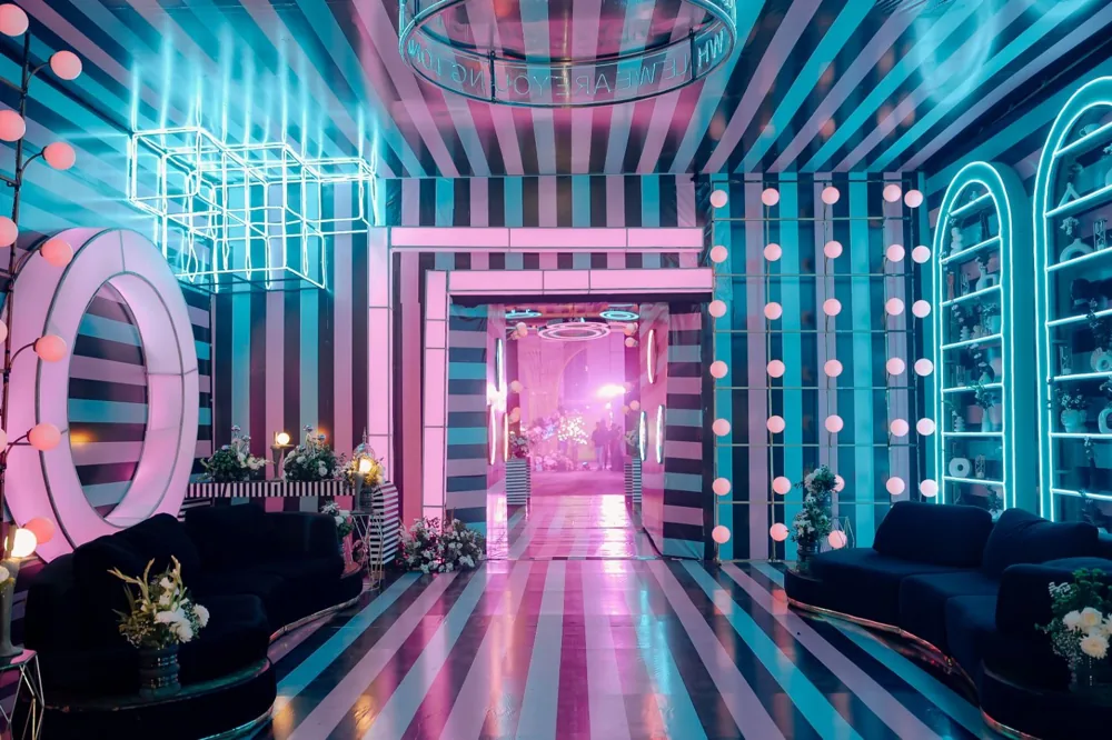 Candy stripe neon sangeet lounge — completed Panigrahana work