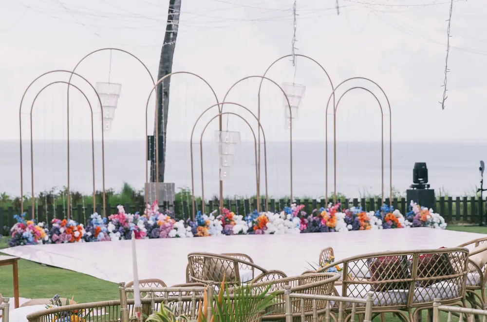 Pastel florals along an outdoor dining table at Ayana Resort — Panigrahana decor portfolio
