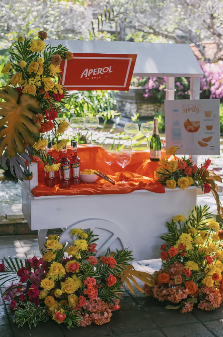 Orange lounge seating and floral garden decor at Grand Hyatt Bali — Panigrahana decor portfolio