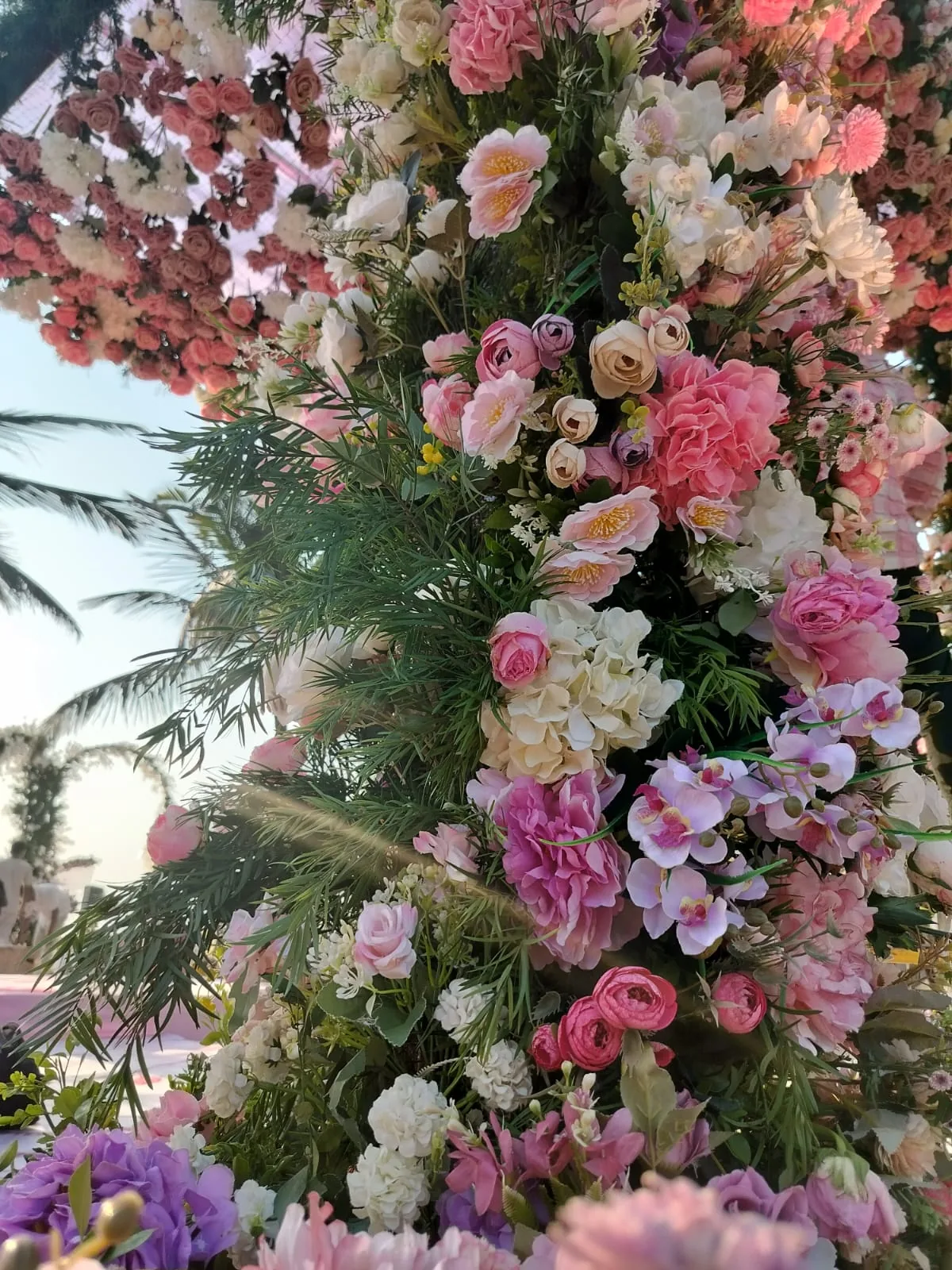 Pink and white flower detail on the ceremony arch at The St. Regis Goa Resort