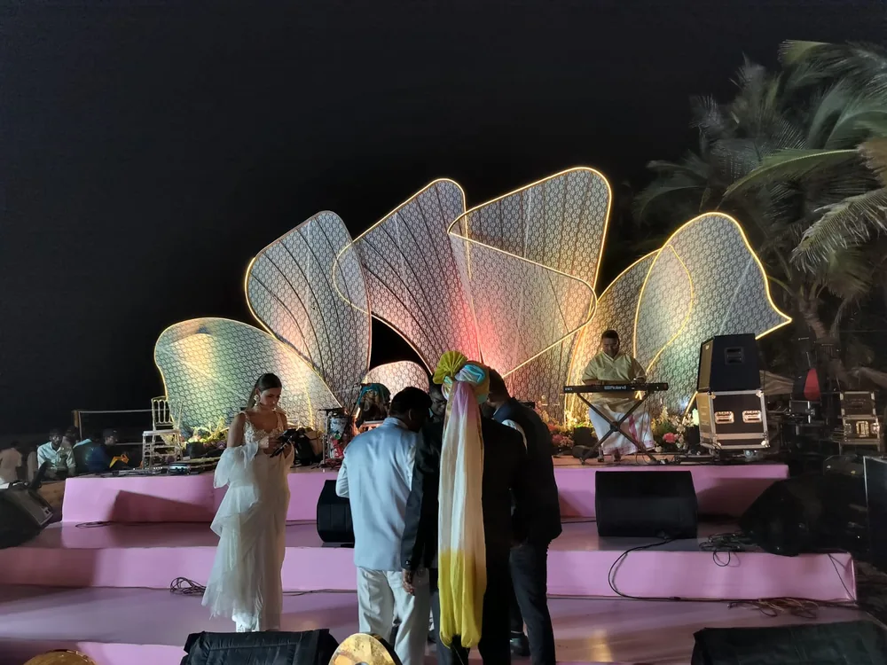 Sculptural illuminated backdrop for an evening celebration at The St. Regis Goa Resort — completed Panigrahana work