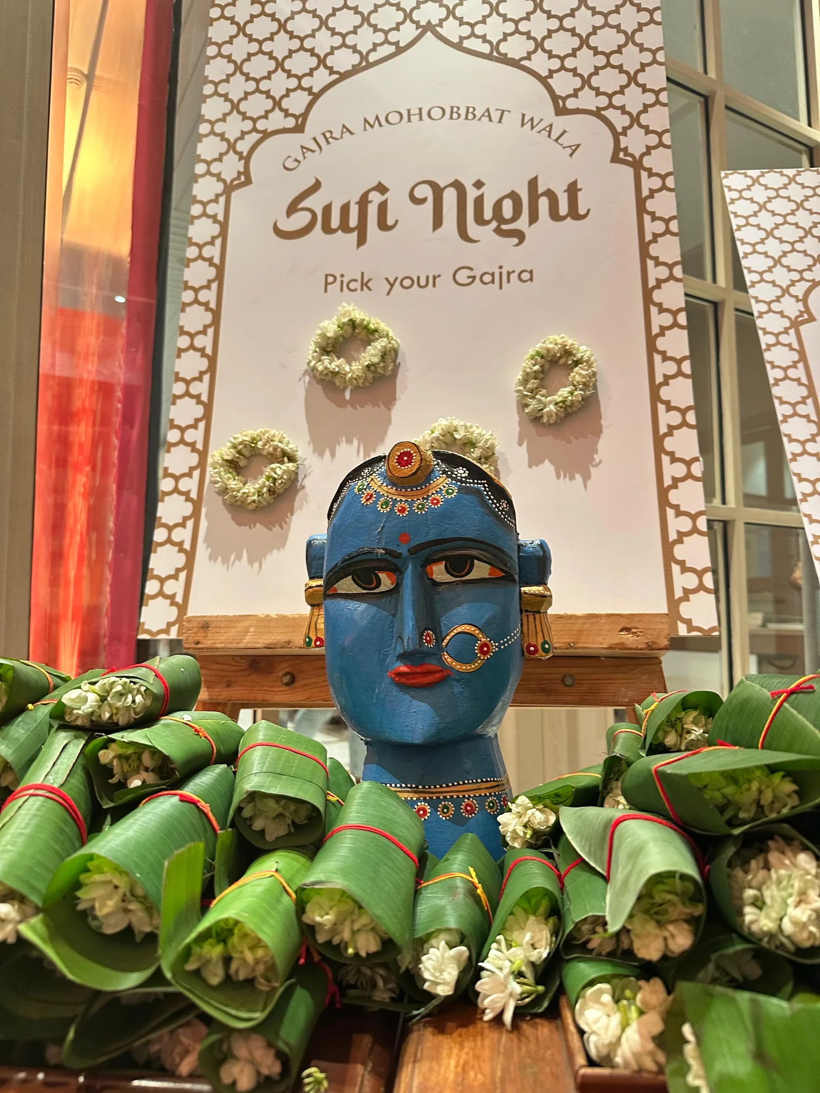 Sufi Night paan counter with a blue decorative bust at The St. Regis Goa Resort