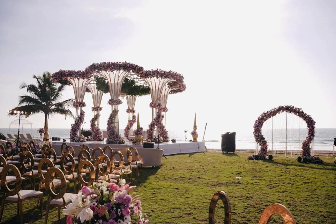 An open-air floral mandap from the Panigrahana wedding production portfolio