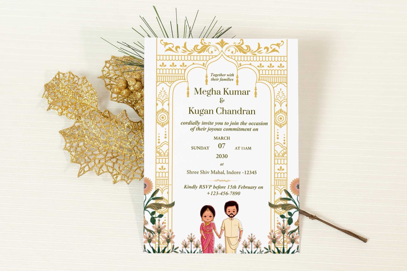 Printed wedding card template with a gold arch border and an illustrated couple in South Indian dress