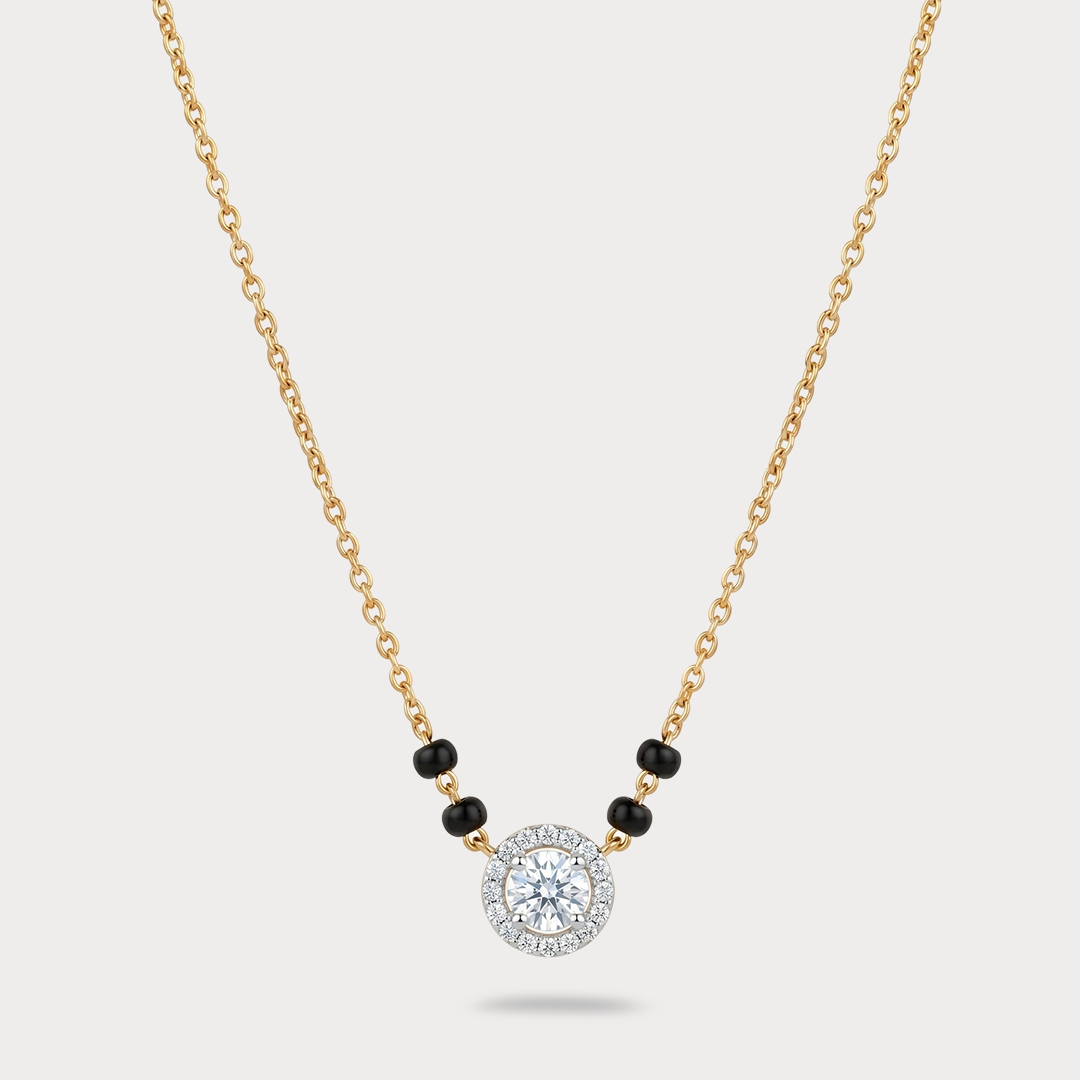 Lab-grown diamond halo pendant on a yellow-gold mangalsutra chain with black beads
