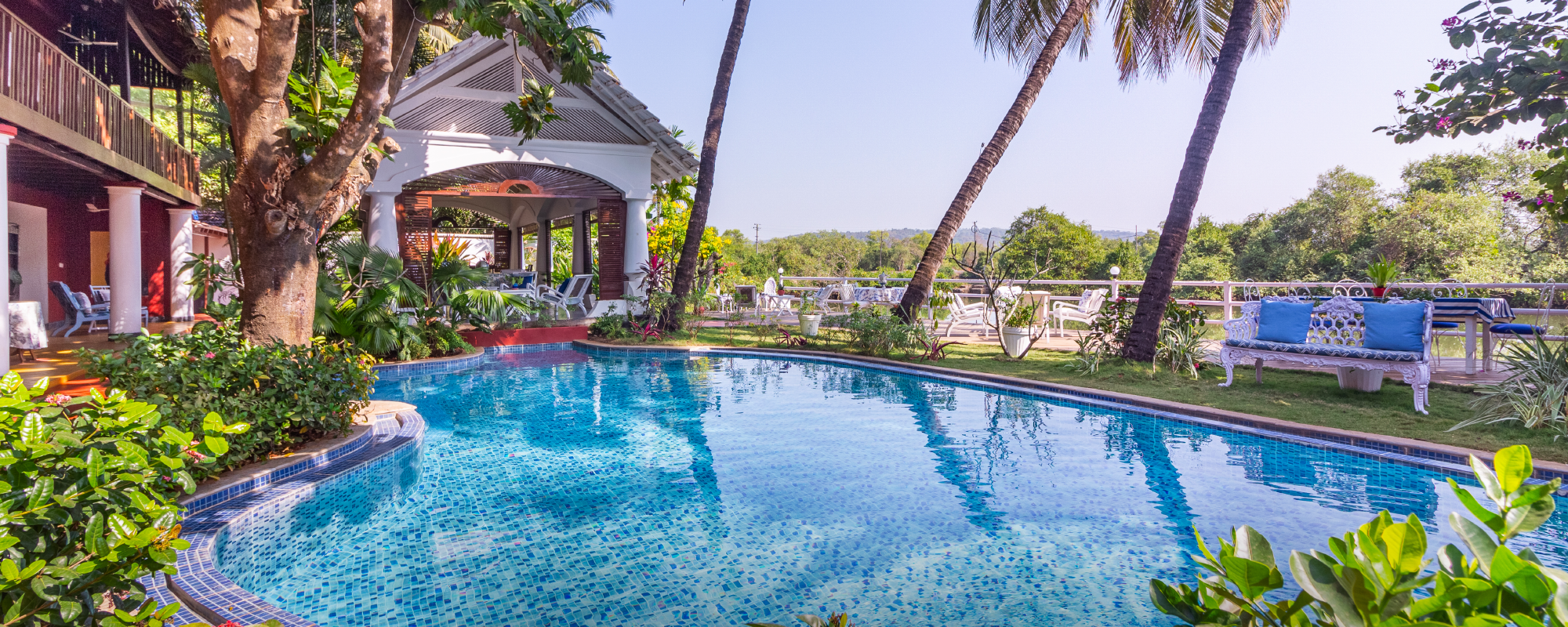 Poolside garden at Casa Britona beside the Mandovi River, Goa