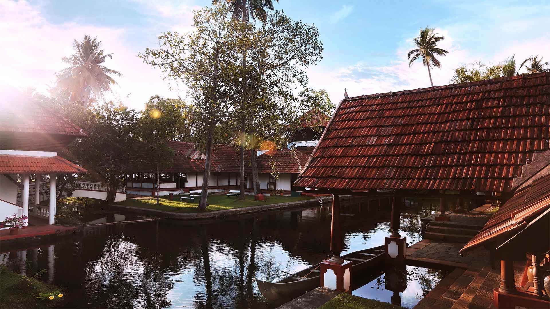 Heritage buildings and canal at CGH Earth Coconut Lagoon in Kumarakom