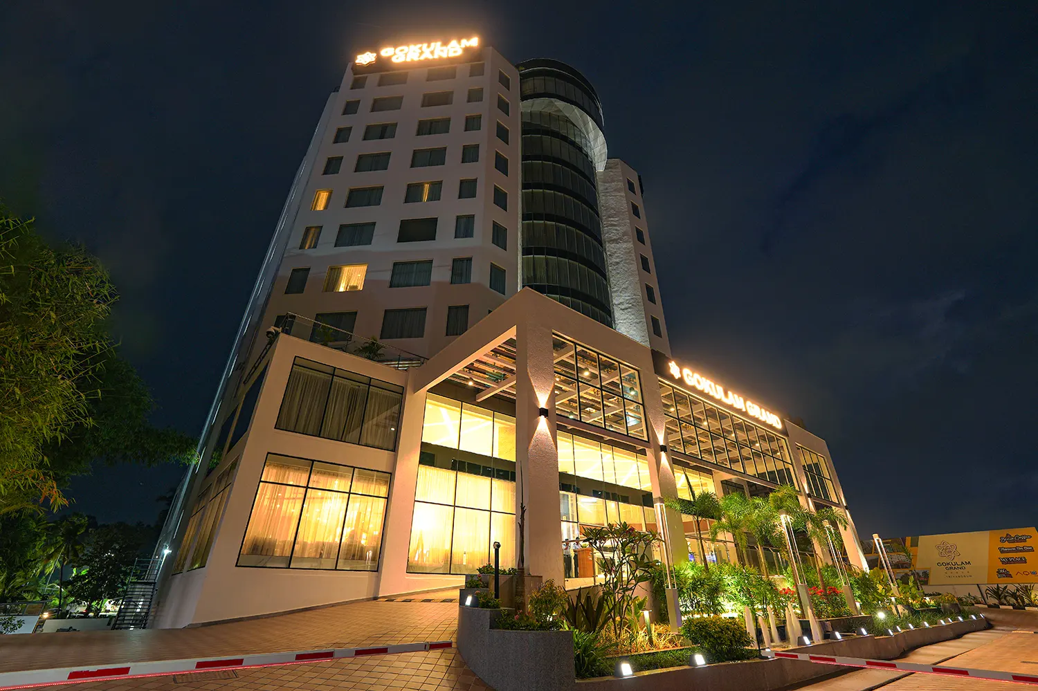 Illuminated facade of Gokulam Grand Trivandrum