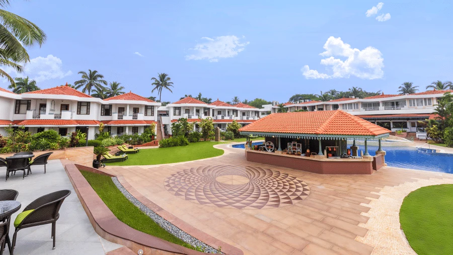 Poolside walkway at Heritage Village Resorts and Spa, Arossim, Goa