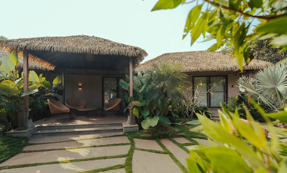 Thatched entrance and planted courtyard at the three-bedroom Garden Villa, ORO