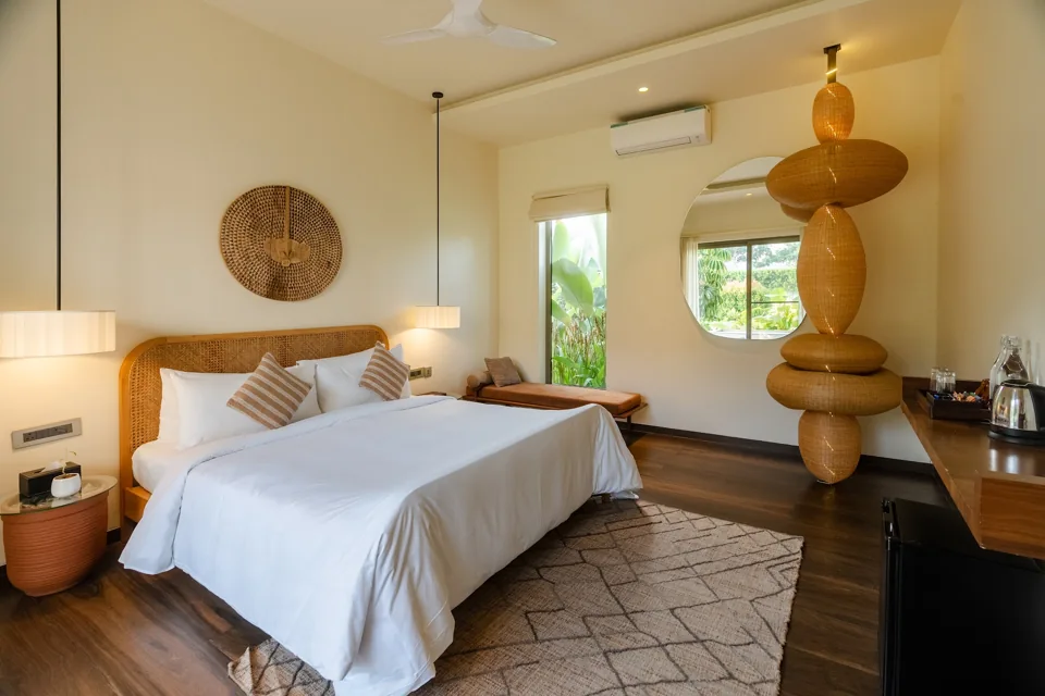 Bedroom with garden views at the five-bedroom ORO Pool Villa