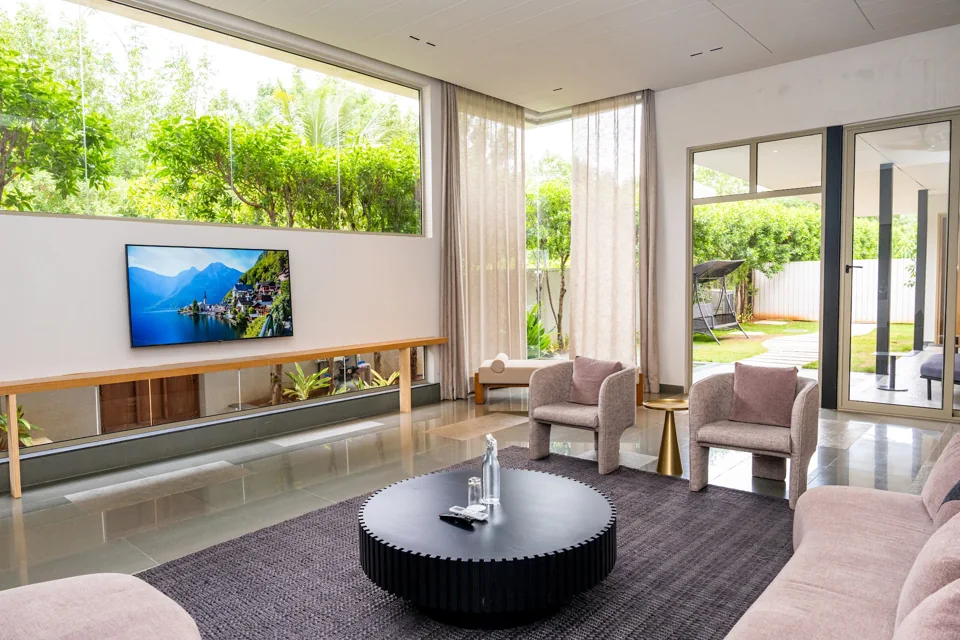 Living room opening onto the private garden at Sanctuary Villa, ORO