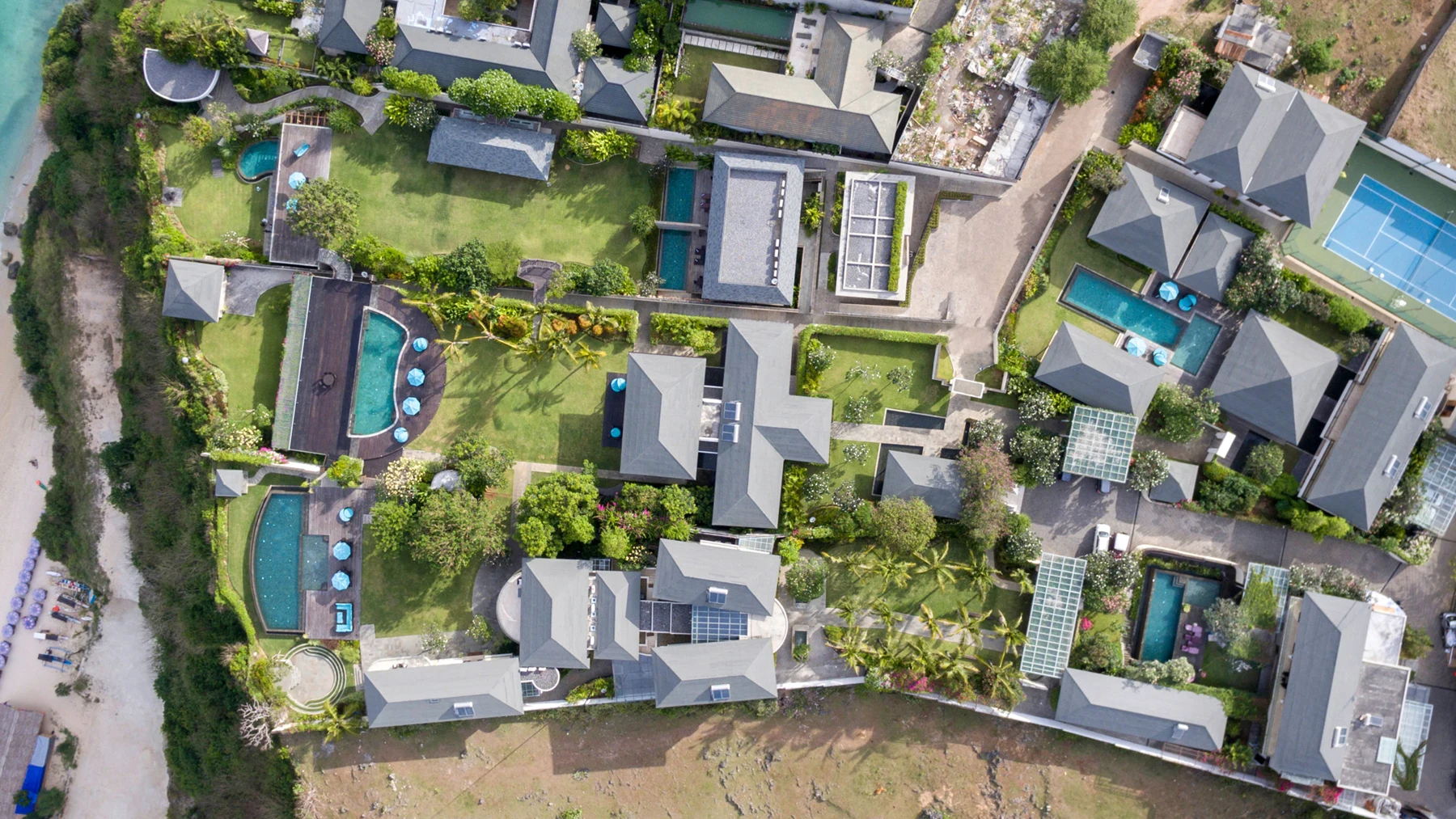 Clifftop villas and gardens at Pandawa Cliff Estate, Bali