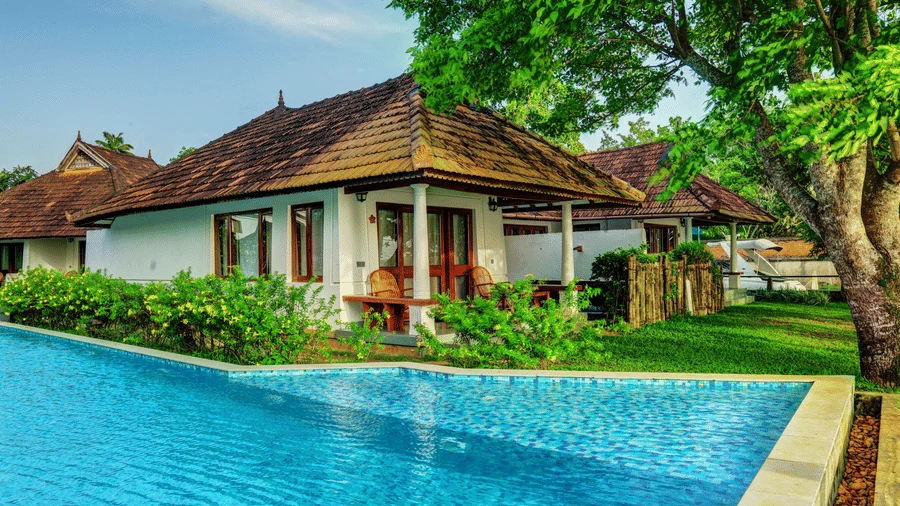 Swimming pool and villas at Rhythm Kumarakom