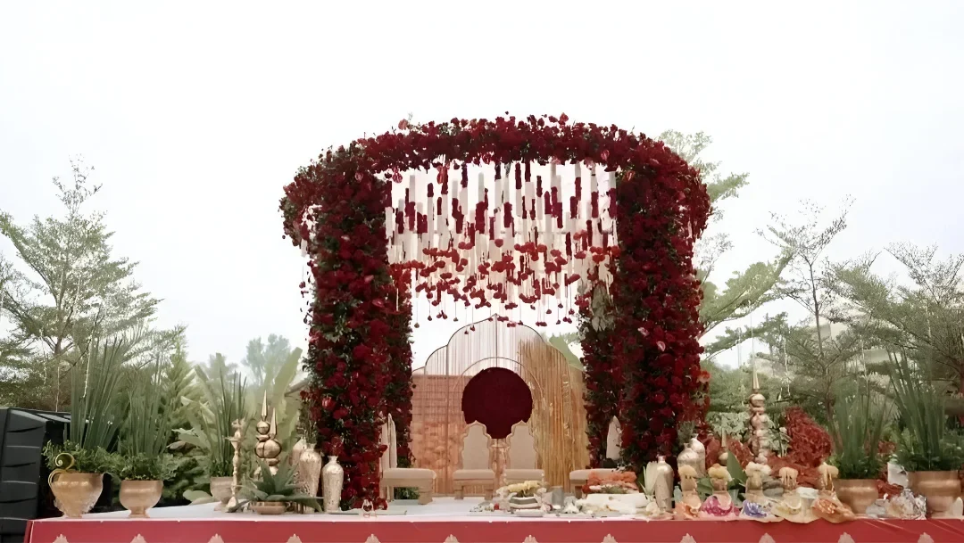 Red floral ceremony stage at Ritam in Yelahanka, Bangalore